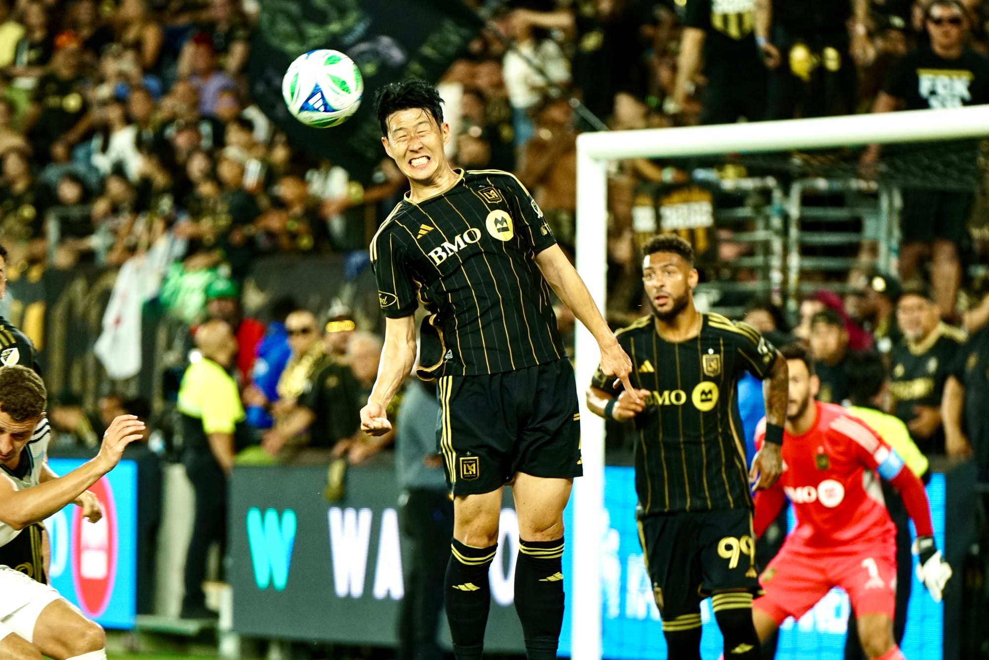 Son Heung-min goes up for a header vs. Colorado (Celso Oliveira / Pitchside USA)